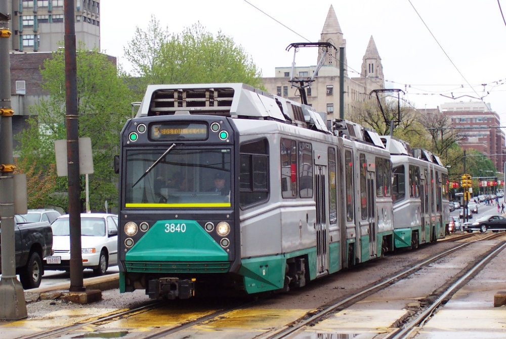 MBTA train on rail line in Boston, MA